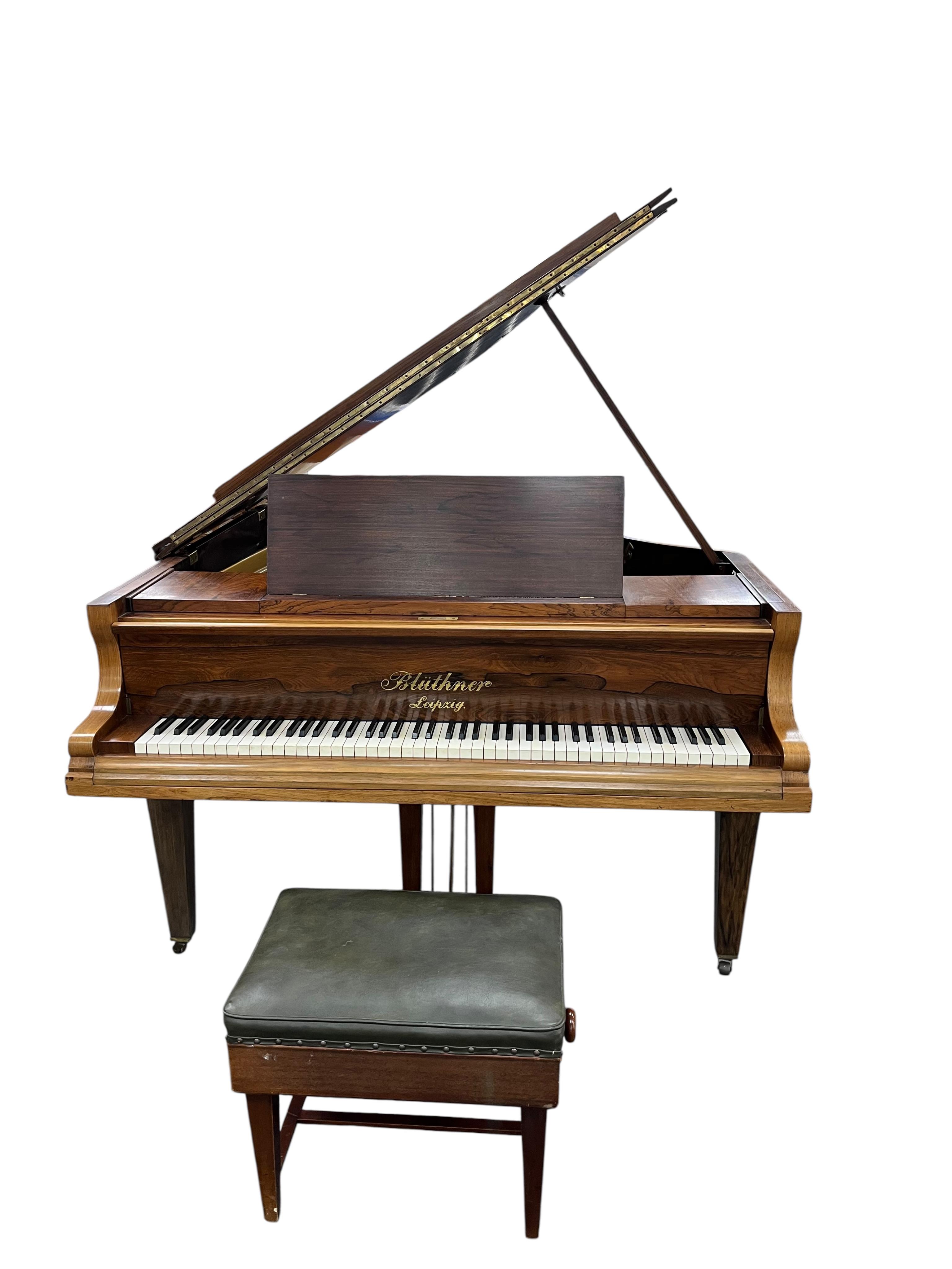 A Bluthner faded rosewood baby grand piano circa 1914, 176cm together with an adjustable piano stool. CITES Submission reference HWK4RNUW